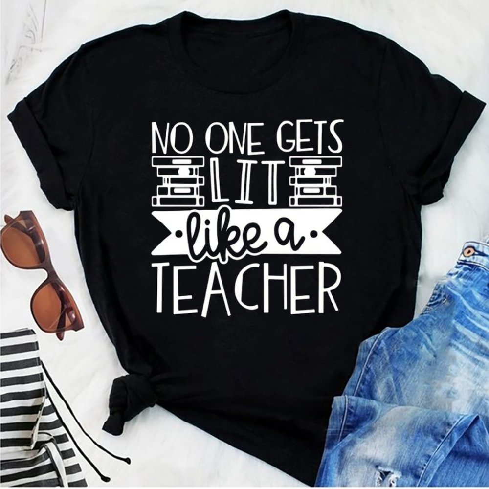 No One Gets Lit Like A Teacher Tshirt Funny Tee - Picture 1 of 4